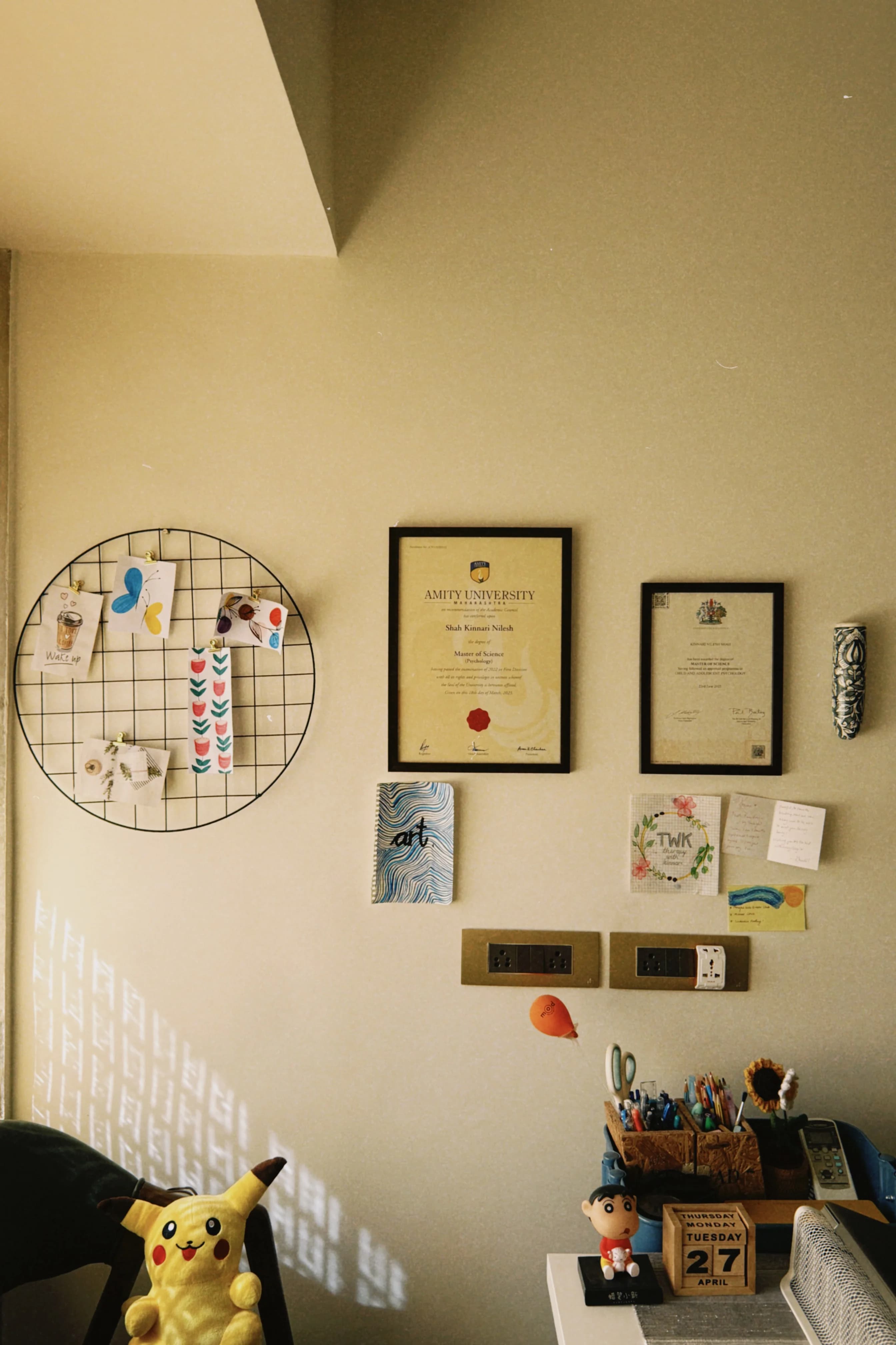 Manav Circle studio wall with creative materials
