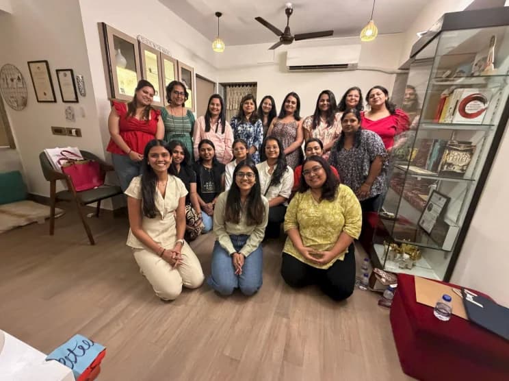 Workshop group photo in a therapy room