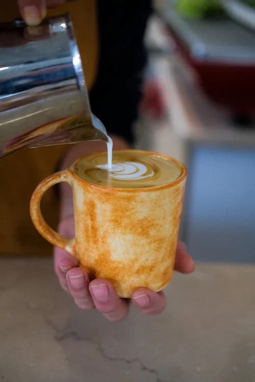 A warm cup being poured