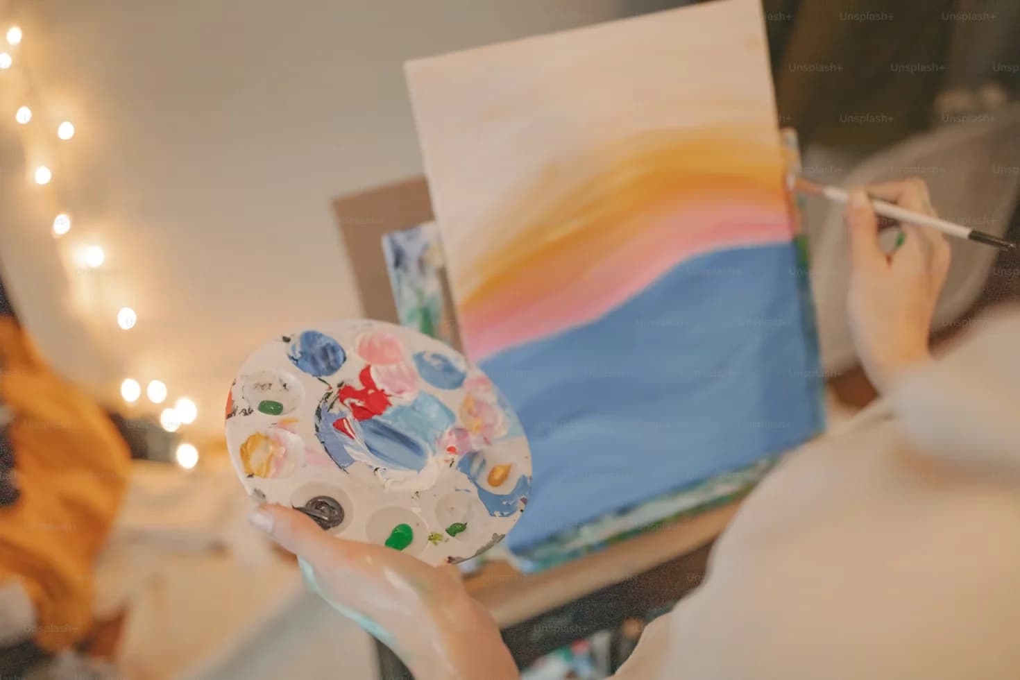 Art therapy materials and rainbow artwork