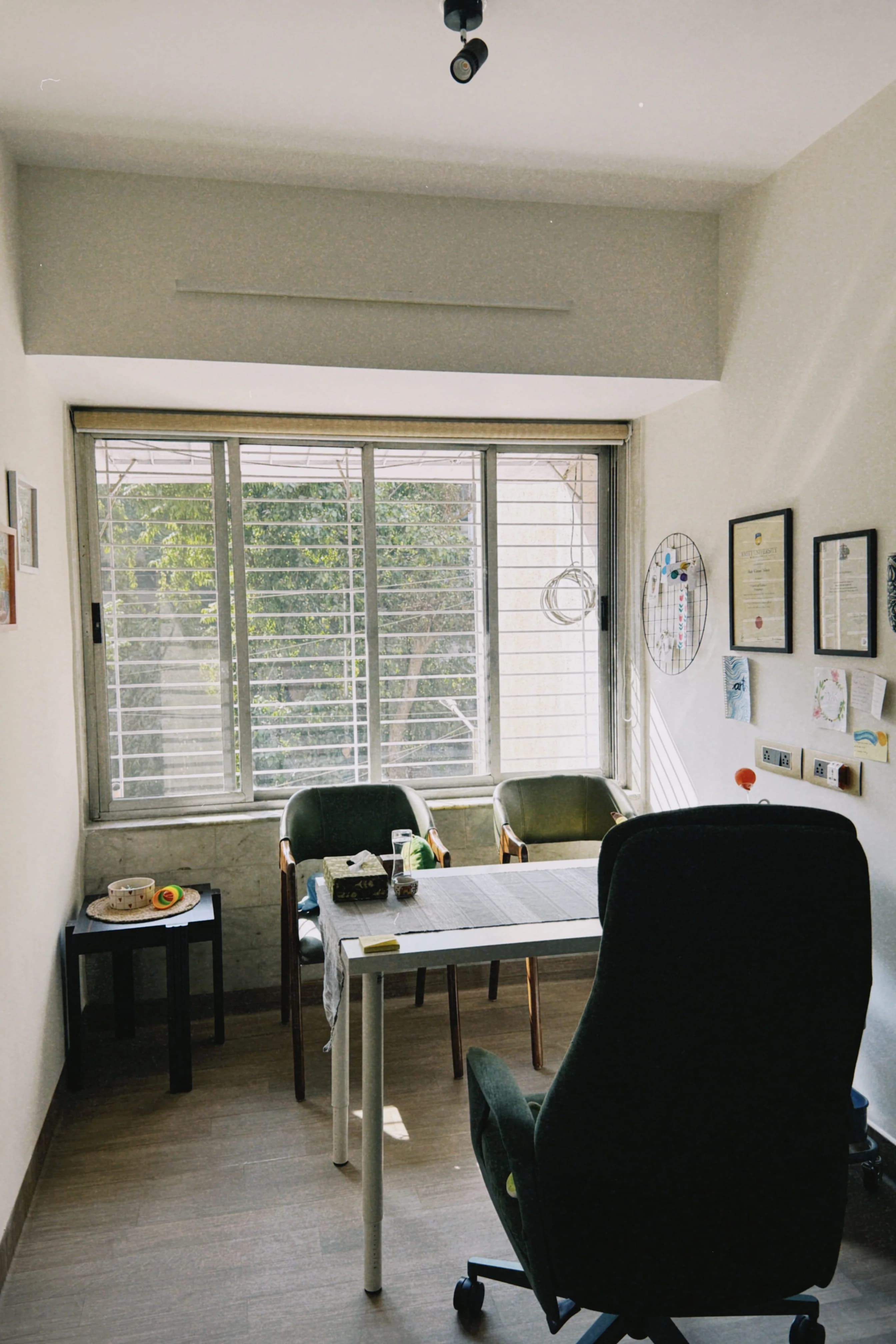Therapy room with chairs and a large window